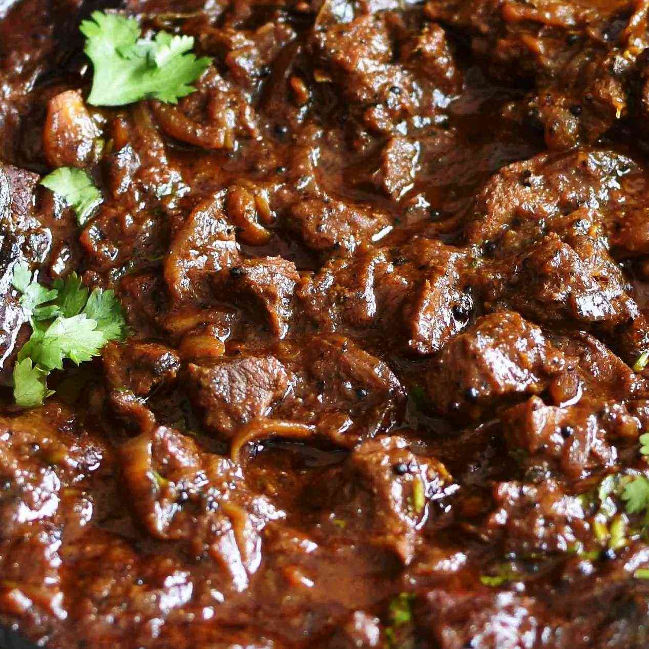 Indulge in the zesty goodness of Beef Pepper Gravy, featuring succulent beef, aromatic black pepper, and a perfect blend of spices for a flavorful and satisfying culinary experience