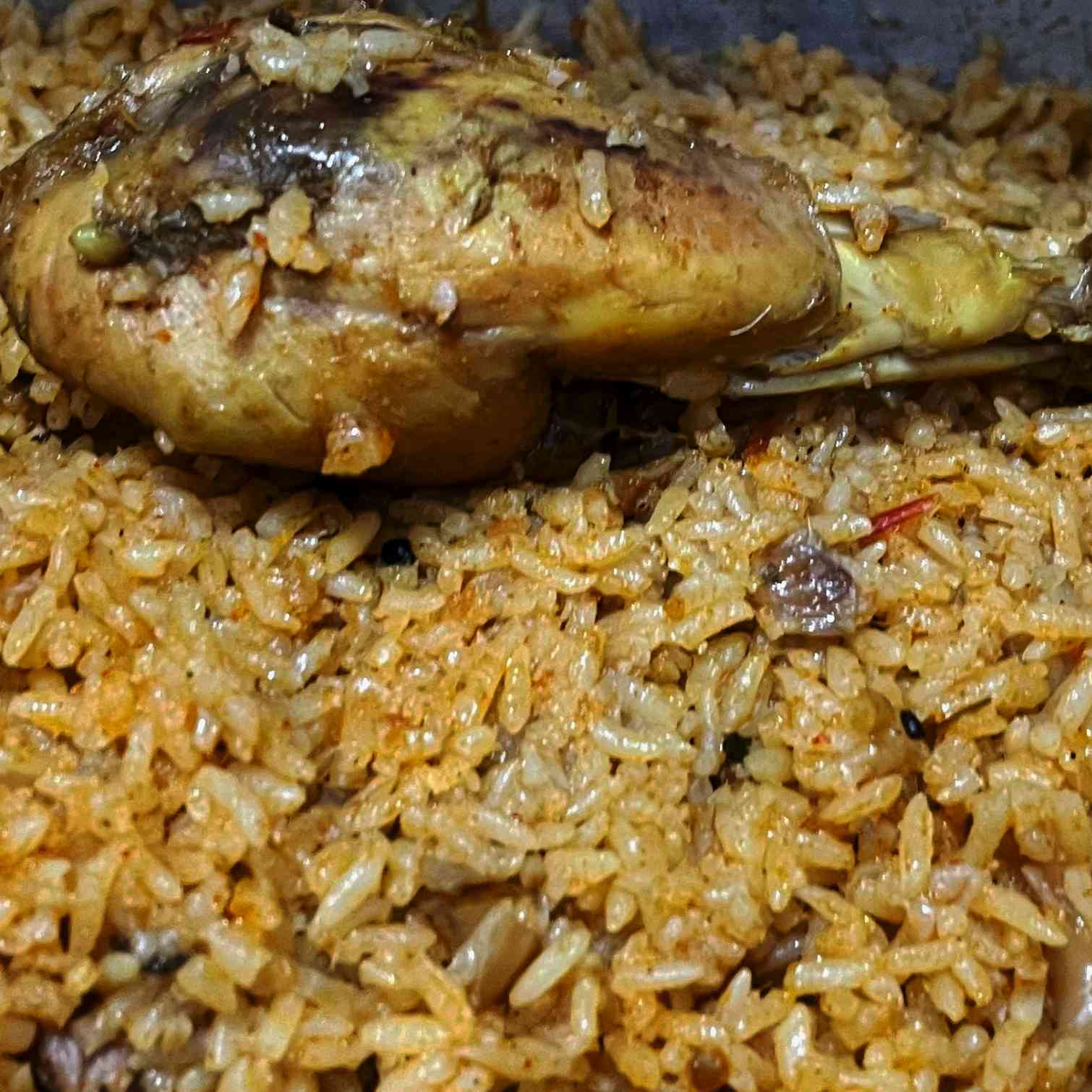 Indulge in the aromatic delight of Chicken Biryani, featuring tender chicken, fragrant seeraga sambha rice, and a harmonious blend of spices for an authentic and flavorful culinary experience