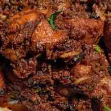 Authentic chicken curry with tender pieces, rich aromatic sauce, and a blend of flavorful spices for a mouthwatering dining experience