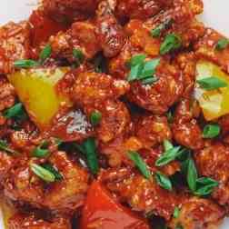 Mouthwatering Chinese-style dry chicken with perfectly seasoned and stir-fried meat, showcasing a delightful fusion of savory flavors and enticing textures