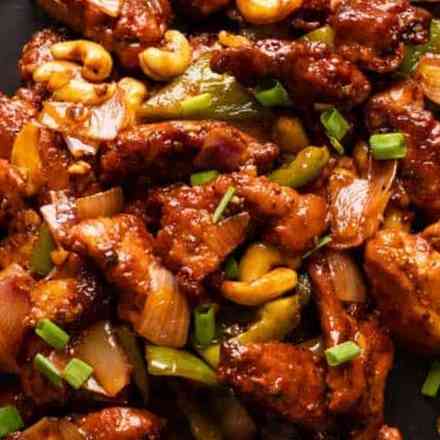 Irresistible Dragon Chicken Dry with crispy bites, fiery spices, and a bold combination of flavors, offering a delightful Asian-inspired culinary experience