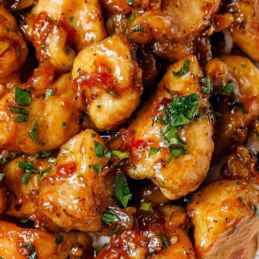 Savor the exquisite flavors of Garlic Chicken Dry, featuring succulent pieces of chicken, aromatic garlic, and a perfect blend of spices for a delicious and satisfying culinary experience