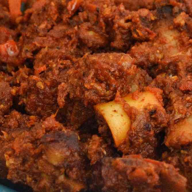 Savor the aromatic delight of Mutton Garlic Dry, featuring tender mutton, aromatic garlic, and a rich blend of spices for a flavorful and satisfying culinary experience